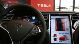 The inside of a Tesla vehicle is viewed as it sits parked in a new Tesla showroom and service center in Red Hook, Brooklyn on July 5, 2016 in New York City.